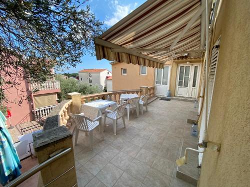Photo de la galerie de l'établissement Apartments Kalluka, à Sveti Stefan