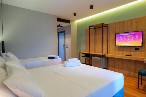 TV a/nebo společenská místnost v ubytování Seawave Hotel