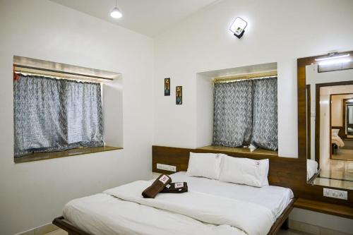 Katil atau katil-katil dalam bilik di Meghmalhar Villa