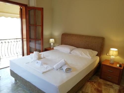 Ένα ή περισσότερα κρεβάτια σε δωμάτιο στο Monteduca Apartments