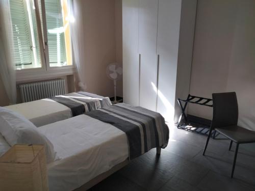 Katil atau katil-katil dalam bilik di Braschi 8 B&B