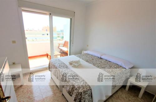 Posteľ alebo postele v izbe v ubytovaní Europark Apartamentos - Ático con vista al mar- Piscina y Playa- Excelente wifi
