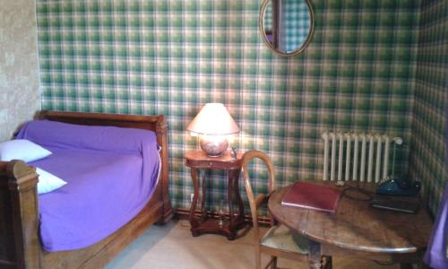 Postel nebo postele na pokoji v ubytování Maison familiale Ronchonnette et mon Repos