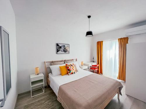 Postel nebo postele na pokoji v ubytování Apartments Happy