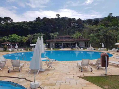 Der Swimmingpool an oder in der Nähe von Casa de Praia em Condomínio Fechado