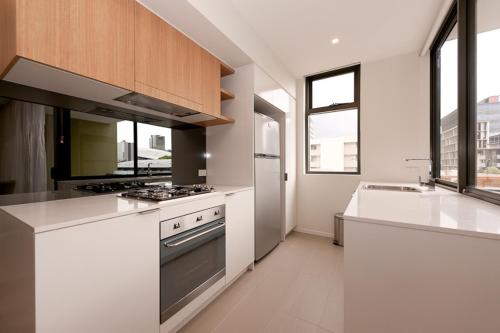 Dapur atau dapur kecil di Vine Apartments South Brisbane