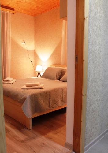Postel nebo postele na pokoji v ubytování Hotel Marliza
