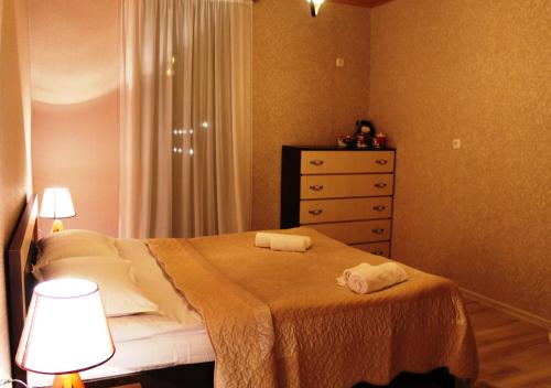 Postel nebo postele na pokoji v ubytování Hotel Marliza