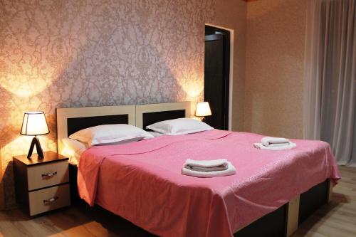 Postel nebo postele na pokoji v ubytování Hotel Marliza