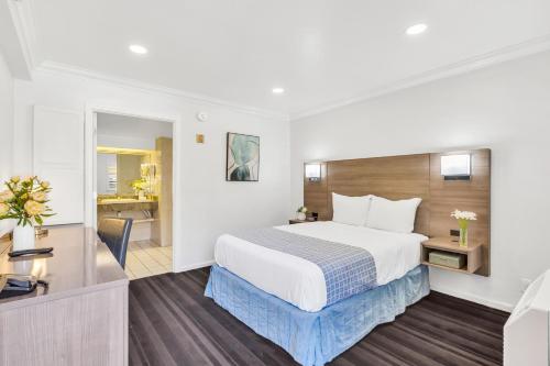 Katil atau katil-katil dalam bilik di Napa Valley Hotel & Suites