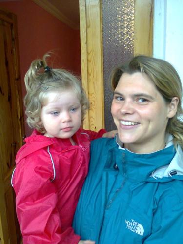 a woman standing next to a little girl at Giorgi's Homestay in Kutaisi