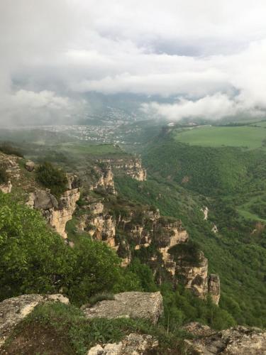 a view of the blue mountains from the top of a mountain at Berkri Gastro Yard & Guest House in Yenokavan
