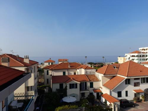 a group of houses with red roofs at Appartamento Luigi in Ventimiglia