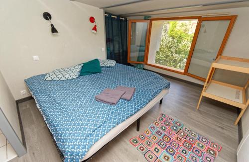 מיטה או מיטות בחדר ב-Ti Kaz Papang