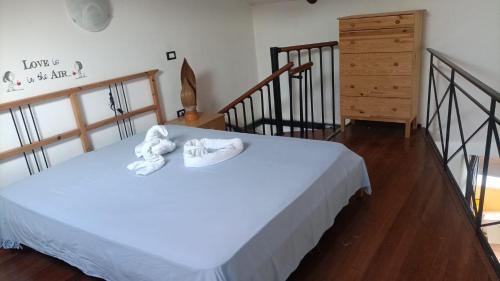 Katil atau katil-katil dalam bilik di Hakuna Matata ,grazioso appartamento in centro