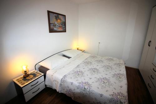 Postel nebo postele na pokoji v ubytování Apartment Leana Selce