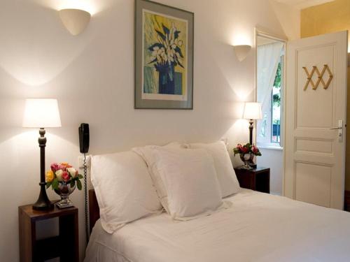 Ένα ή περισσότερα κρεβάτια σε δωμάτιο στο Hotel La Bougnate