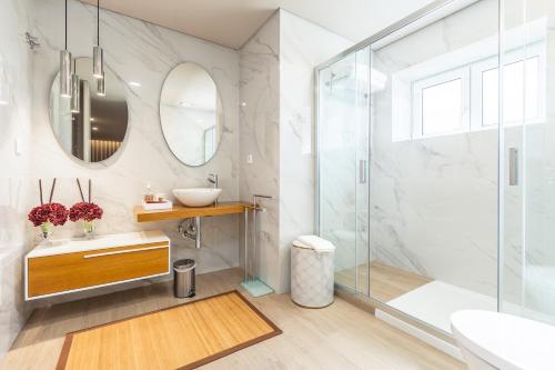 Et badeværelse på O CERVO CHARM HOUSE