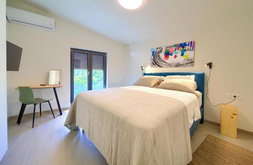 Katil atau katil-katil dalam bilik di Apartments Sol