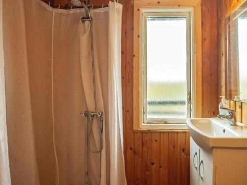 Ένα μπάνιο στο Holiday home Roslev IV