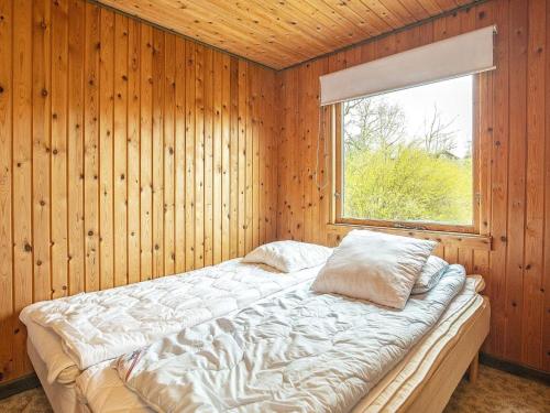 Ένα ή περισσότερα κρεβάτια σε δωμάτιο στο Holiday home Roslev IV