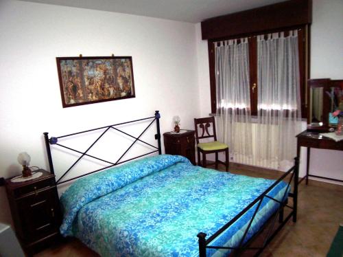 Postel nebo postele na pokoji v ubytování B&B Il Parco