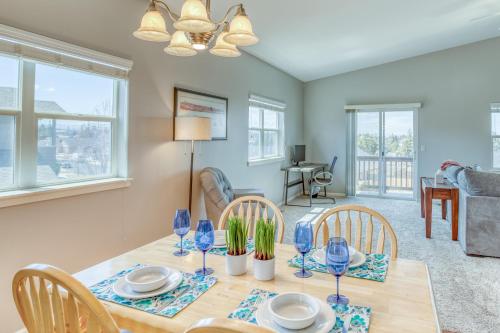 a dining room and living room with a table and chairs at Hunters Circle - Meredith Lodging in Bend