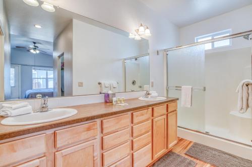 a bathroom with two sinks and a shower at Hunters Circle - Meredith Lodging in Bend