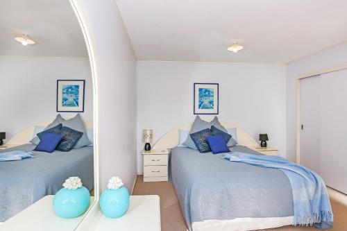 Postel nebo postele na pokoji v ubytování Self Contained Cottage Pukekohe