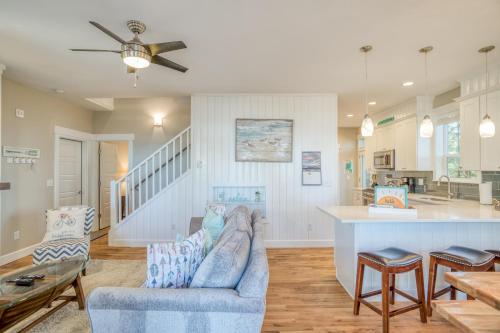 a living room with a couch and a table at Dune With A View in Lincoln City