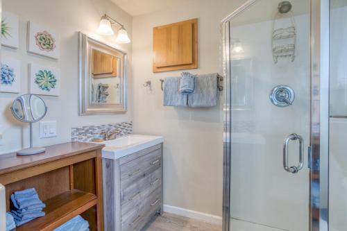 a bathroom with a sink and a shower at Riverfront Gem - Meredith Lodging in Cloverdale