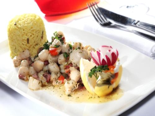 a plate of food with potatoes and other foods at Best Western Palace Hotel & Casino in Douglas