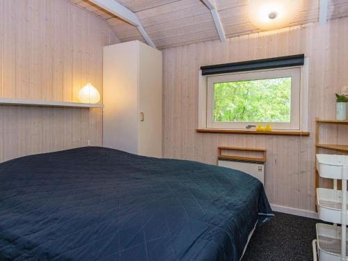 Een bed of bedden in een kamer bij Holiday home Ebeltoft CLXXXVII