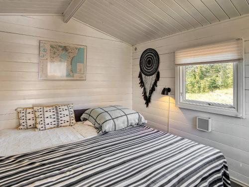 Postel nebo postele na pokoji v ubytování Holiday home Væggerløse CCXIV