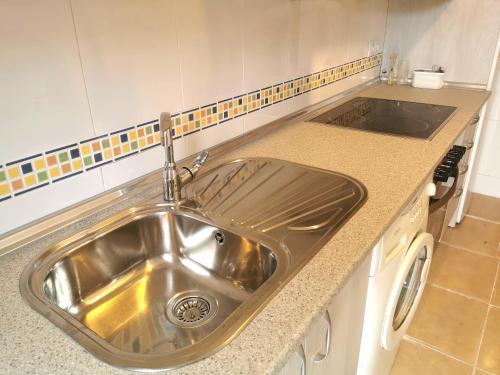 Kuchyň nebo kuchyňský kout v ubytování Riaza Vacacional - Apartamento en el centro