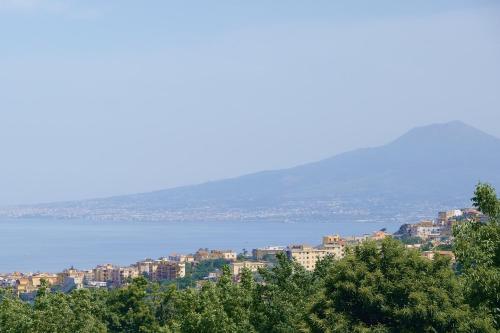 a view of the city and the water at B&B Maria Grazia in Vico Equense
