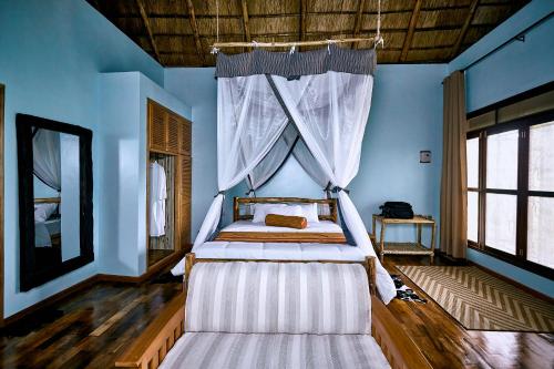 Voodi või voodid majutusasutuse Buffalo Safari Lodge toas