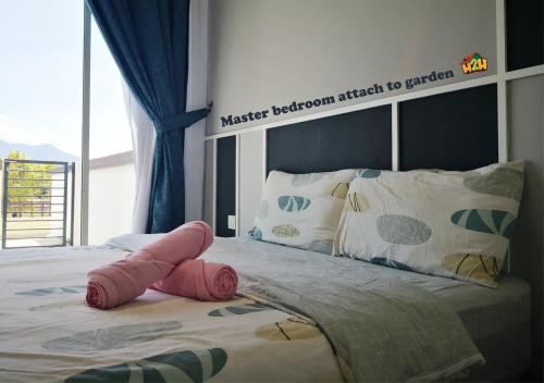 a bedroom with a large bed with a large window at H2H - CY7 @ Majestic Ipoh in Ipoh