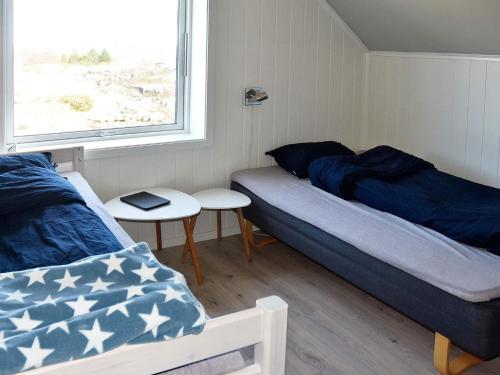 Postelja oz. postelje v sobi nastanitve Holiday home Bølandet