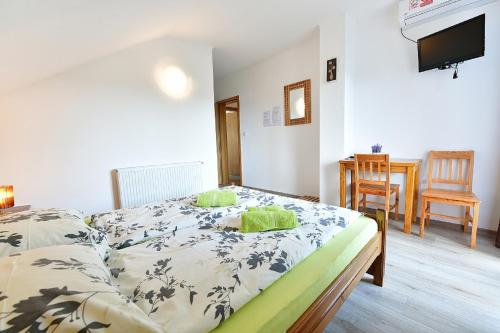 Ένα ή περισσότερα κρεβάτια σε δωμάτιο στο House Bićanić