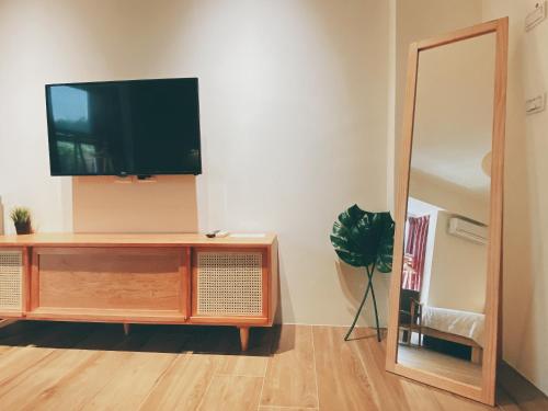 TV a/nebo společenská místnost v ubytování Wanna Travel B&B