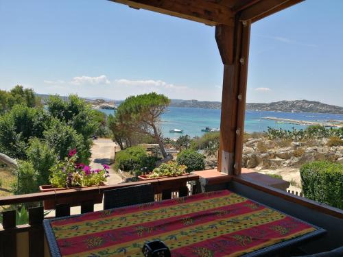 a large window with a view of the ocean at B&B Il Corallo in La Maddalena