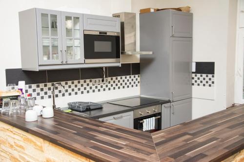 Kuchyň nebo kuchyňský kout v ubytování Andrassy Room