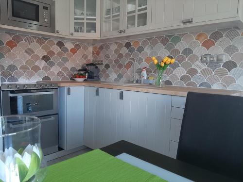 Η κουζίνα ή μικρή κουζίνα στο Best Relax Hévíz Apartman