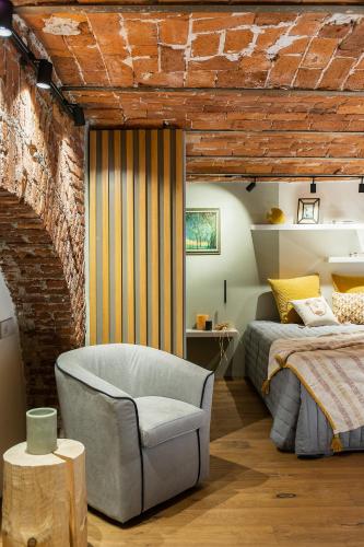 Una cama o camas en una habitación de Bellevue Navigli