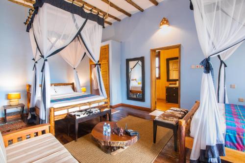 Voodi või voodid majutusasutuse Buffalo Safari Lodge toas