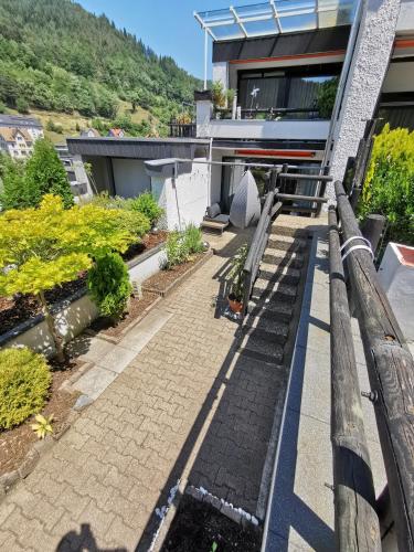 a view of a garden from the balcony of a house at Terrassenwohnung mit toller Aussicht & zentrumsnah in Hornberg