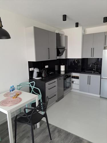 Dapur atau dapur kecil di Apartament Pudrowy