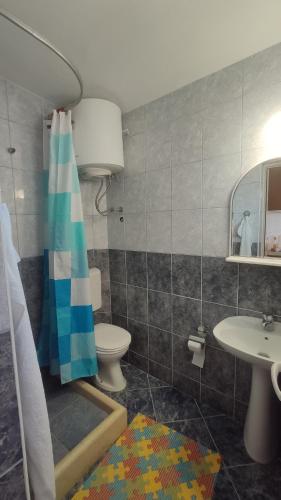 Koupelna v ubytování Apartments Marniković