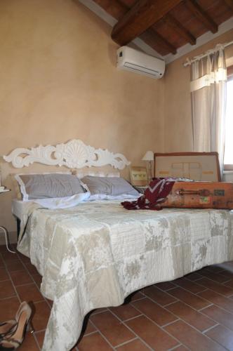Una cama o camas en una habitación de Podere Calledro